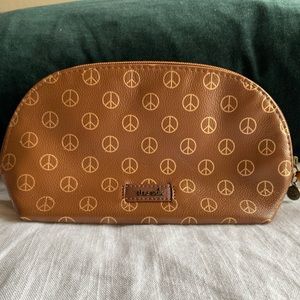 The Sak makeup bag